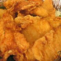 Home-Style Chicken Fingers · Served with choice of sauce.
