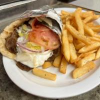 GYRO sandwich  · Beef and lamb wrap in a pita bread with lettuce tomatoes onions and tzatziki sauce 
Comes wi...