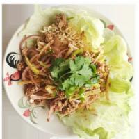Larb Mama Pa-Plean · Thai noodle with ground pork and roasted rice with spicy chili lime dressing. Add shrimp for...