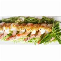 Flashing Shrimps · Lightly cooked shrimps with garlic, mint and chill lime dip.