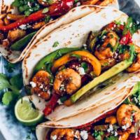 Shrimp fajitas · Mixed Bell peppers, Sauteed Onions serve with Pico de gallo, Cheese, Flour tortillas and Ric...