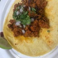 Taco de Chorizo  · Mexican sausage taco with cilantro & onions on corn tortillas. Salsa will be on the side. 
