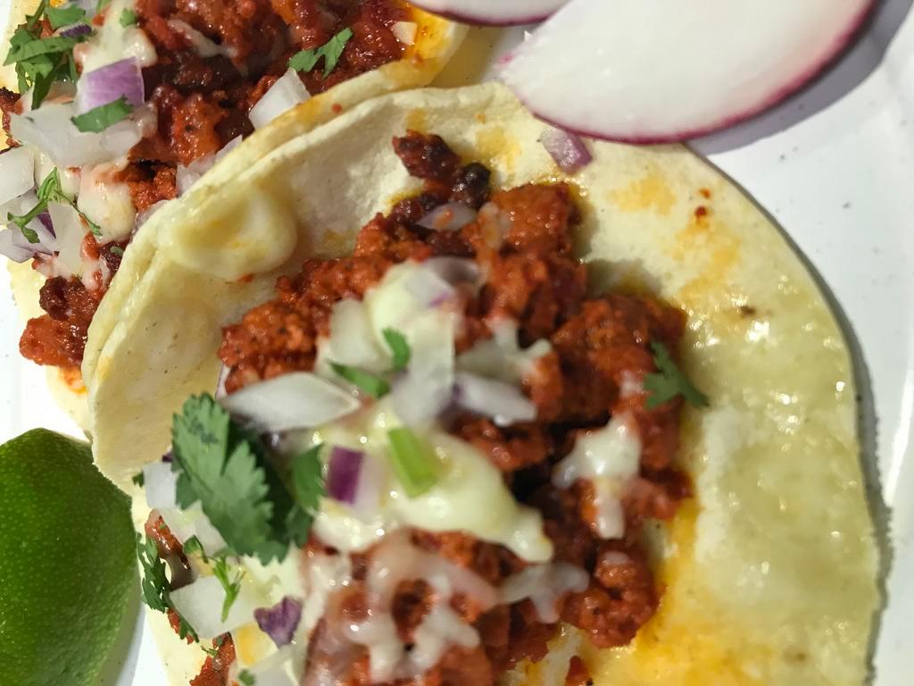 Taco Chorizo con Queso  · Mexican sausage, melted chihuahua cheese, onions and cilantro on corn tortillas. Salsa will be on the side. 