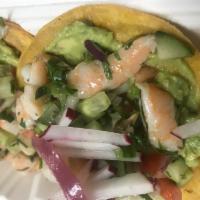 Camaron Tostada 2pcs · Avocado, shrimp, lime juice, cucumber, onion, jalapeno and cilantro.