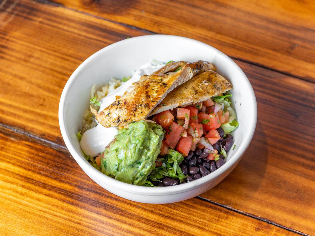 Pollo Asado Rice Bowl · Grilled chicken with Mexican rice & Beans, Jack cheese, Pico De Gallo, Lettuce, and Sour cream on top with Salsa Verde on the side.
