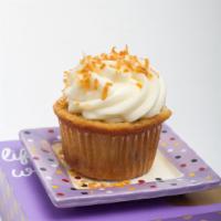 Heavenly Italian Cream Cupcake up · A vanilla cake filled with coconut, toasted pecans topped with a buttery cream cheese frosti...