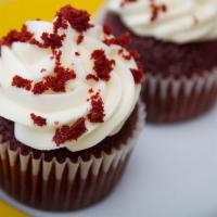 Southern Red Velvet · A buttermilk cake flavored with a hint of cocoa, tinted red, and topped with a buttery cream...