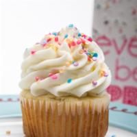 Very Vanilla Cupcake · Deeply flavored vanilla cake topped with a well balanced vanilla American buttercream and sp...