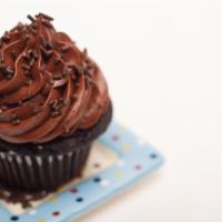 Guiltless Chocolate Cupcake · A decadent chocolate cake made with a high ratio dark chocolate topped with a chocolate fudg...