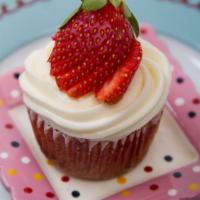 Strawberry De La Creme Cupcake · Not-so-typical strawberry cake filled with chunks of fresh strawberries boasting bursts of f...