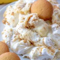 Southern Banana Pudding · A fluffy pudding with real bananas and vanilla wafers topped with fresh whipped cream.