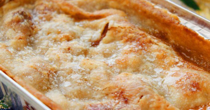 Peach Cobbler · A traditional cobbler filled with ripe peaches, seasoned with spices between 2 buttery crusts.