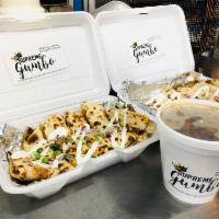 Gumbo Quesadillas  · Cajun sausage, chicken, cheese, onions, and sour cream.