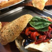 Tuscan Panini · Mozzaralla, grilled chicken, fresh mozzarella, roasted pepper, balsamic glaze, and fresh bas...