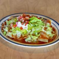 Supremas Enchilada · 1 chicken, 1 bean, 1 cheese and 1 beef enchilada all topped with enchilada sauce, lettuce, g...
