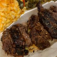 Thick Cut Ribeye Steak · Served with 2 sides. Please specify how you will like steak prepared.