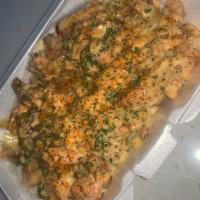 Seafood Fries  · Served with salmon, lump crab and shrimp with our signature bar cheese sauce