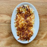 Side Shredded Hashbrowns · A side of our classic grilled, shredded hashbrowns.