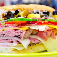 20. The Maverick Sandwich · Provolone, Swiss, American cheese, ham, pastrami, turkey, cotto salami, pepperjack, pepperon...
