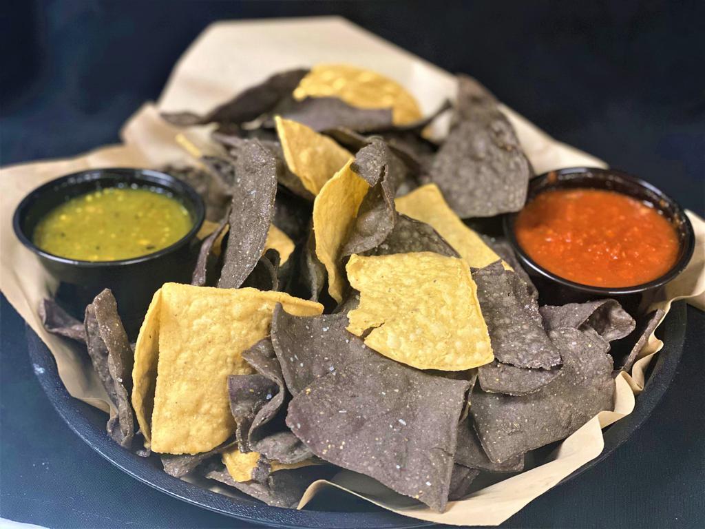 Chips and Salsa · Fresh fried corn tortilla chips served with housemade red or green salsa.