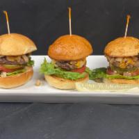 Strip Sliders · 3 beef sliders with American cheese, lettuce, tomato, grilled onion and pickle on brioche bu...