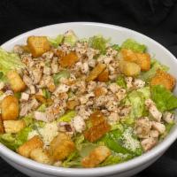 Classic Caesar Salad · Romaine lettuce tossed with Caesar dressing, Parmesan and croutons. Add grilled chicken for ...