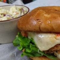 Spring Chicken Sandwich · Grilled or Crispy Chicken Breast topped with lettuce, tomato, red onion and melted swiss. Se...