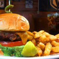 Chef's Stuffed Jalapeno Burger · Stuffed with cream cheese, bacon, diced jalapenos. Topped with cheddar, lettuce, tomato. Our...