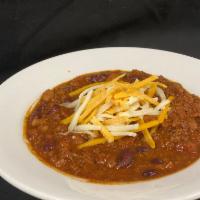 Chili · House made chili with beef and beans topped with jack and cheddar cheese. Served with garlic...