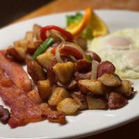 Bogey's Breakfast · 2 eggs cooked any style, served with hash browns or breakfast potatoes and toast. Add side o...