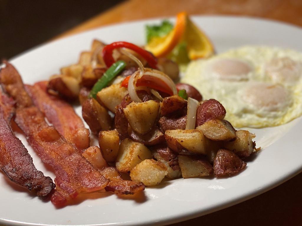 Bogey's Breakfast · 2 eggs cooked any style, served with hash browns or breakfast potatoes and toast. Add side of bacon or sausage for an additional charge.