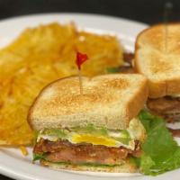 Ultimate Sunrise Sandwich · Fried egg, bacon, lettuce, tomato, avocado on sour dough served with hash browns or breakfas...