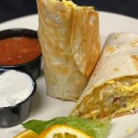 Breakfast Burrito · Flour tortilla stuffed with scrambled eggs, bacon bits, green chiles, hash browns and blende...