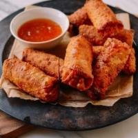 2 Vegetable egg roll · With tomato sauce