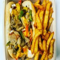 Philly Cheesesteak  · Thin sliced griddled Seitan, Peppers, Onions, with melted cheese on a hoagie roll with mayo ...