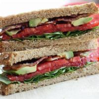 Big BLAT Sandwich · Peppered bacon, avocado, fresh leaf lettuce, tomatoes, and mayonnaise on a toasted wheat bre...