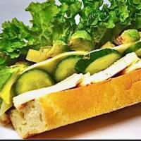 Veg Out Sandwich · Avocado. Mozzarella, provolone, pepperoncini, cucumbers, lettuce, tomatoes, and a sun-dried ...