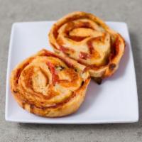 Pinwheel · Thin crust pizza dough wheel with your choice of topping.
spianch ,pepperoni ,broccoli or ham