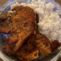 Fried Pork Chops · Thick cut of meat from a pig typically cut from the spine.