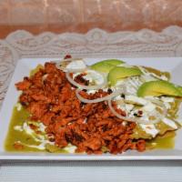 Chilaquiles · Chips soaked in green or red sauce, epazote Mexican herb, onions, cotija  cheese, Mexican cr...
