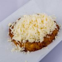 Arepa de Chocolo con Queso · Sweet arepa with melted cheese.