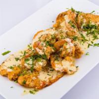 Filete Empanizado Con Camaron En salsa Blanca · Bread Fish Filete with shrimp in delicious white sauce