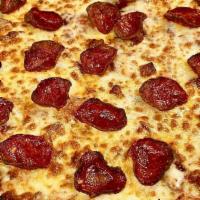 Meat Lovers · Chicago’s Famous Thin Crust Pizza Made Fresh With Halal Bacon, Halal Sausage, And Halal Pepp...