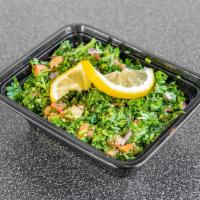 Tabbouleh Salad Regular · Chopped parsley, tomato, onion, and cracked wheat mixed with lemon dressing