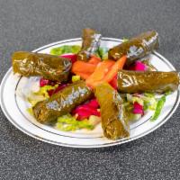 Grape Leaves · 6 pieces. Vegetarian grape leaves made with rice and herbs.