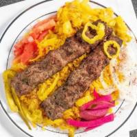 Lounge Kofta Plate · Meat 2 pieces of kofta served with basmati rice, pita bread and veggies.