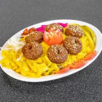 Lounge Falafel Vegetarian Plate · 6 pieces of deep-fried chickpea falafel served with basmati rice, pita bread, hummus, and so...