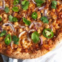 BBQ Chicken Pizza · BBQ Sauce, Mozzarella Cheese, Chicken, Red Onions, Cilantro, Jalapeños