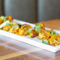 Yo Birdie! Signature Wings · Mary's natural chicken wings tossed in secret sauce, lime juice, fresh cilantro, and cool cu...