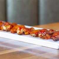 BBQ Wings · Mary's natural chicken wings tossed in house BBQ sauce.